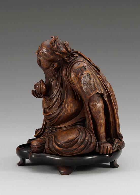 A carved bamboo figure of Do Fan So, Qing dynasty (1644-1912).