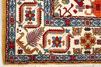 A carpet, semi-antique Qum, ca 342,5 x 222 cm.