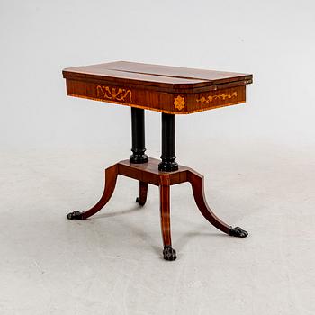 A mid 1800 late Empire game table.