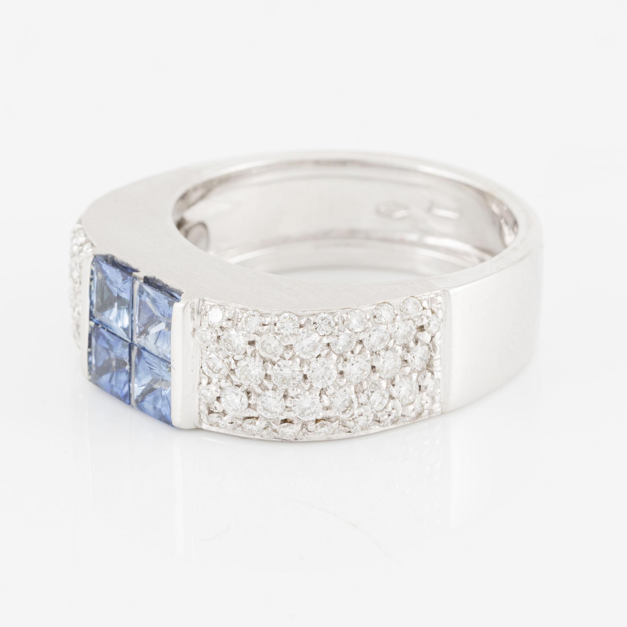Ring in 18K white gold set with round brilliant-cut diamonds and faceted sapphires.