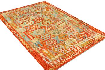 A Kilim carpet, c. 290 x 198 cm.