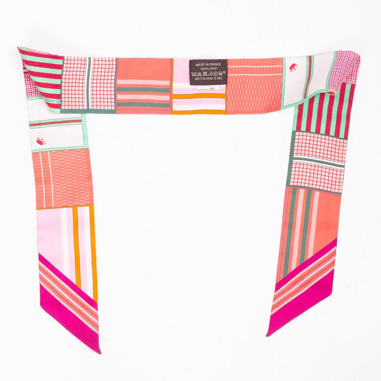 Hermès, a 'Twilly' scarf.