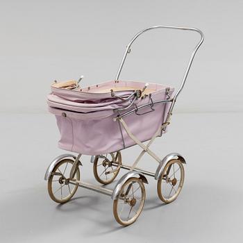 A TOY BABY CARRIAGE, 1960s.