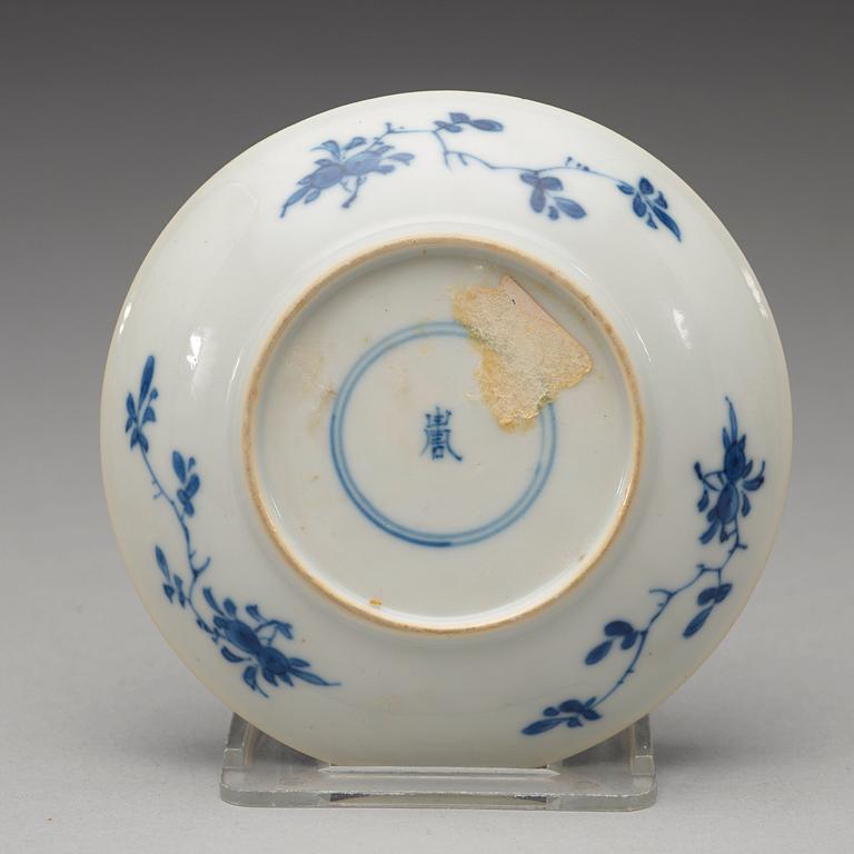 A set of four matched blue and white cups and saucers, Qing dynasty Kangxi (1662-1722).