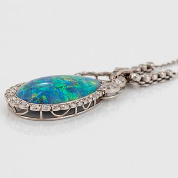 A platinum and black opal necklace set with old- and eight-cut diamonds.