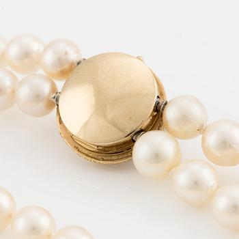 Ole Lynggaard, double-strand pearl necklace, clasp in 18K gold with a brilliant-cut diamond.