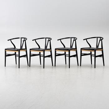 Hans J. Wegner, four CH24/ "Wishbone" chairs, Carl Hansen & Son, Denmark, 21st century.