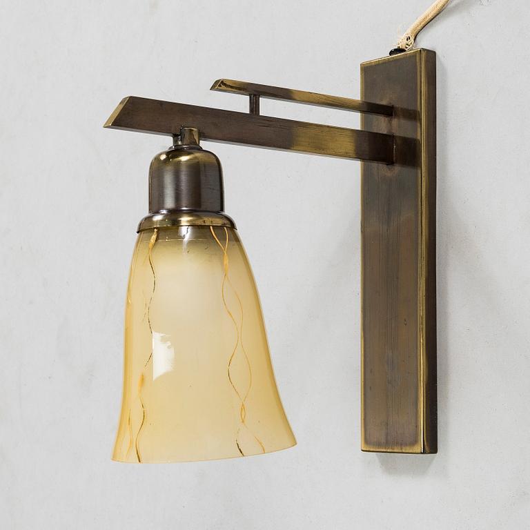 Paavo Tynell, a mid-20th-century wall light by oy Taito ab,