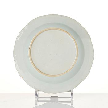 A group of famille rose 'double peacock' serving dishes, Qing dynasty, Qianlong (1736-95). (8 pieces).