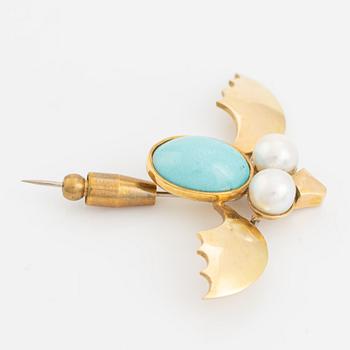 An 18K gold brooch set with a turquoise and cultured pearls.