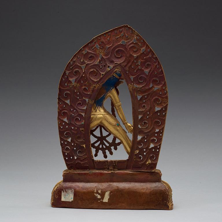 A Tibetan cast gilt copper alloy figure of Sarvabuddhadakini, 19th Century.