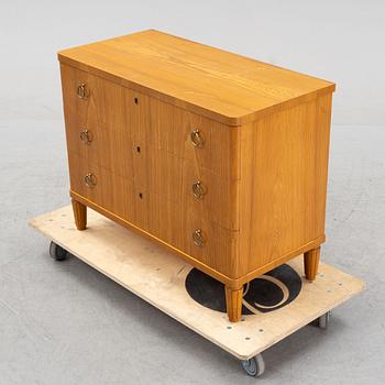 An elm wood veneered dresser, mid 20th Century.