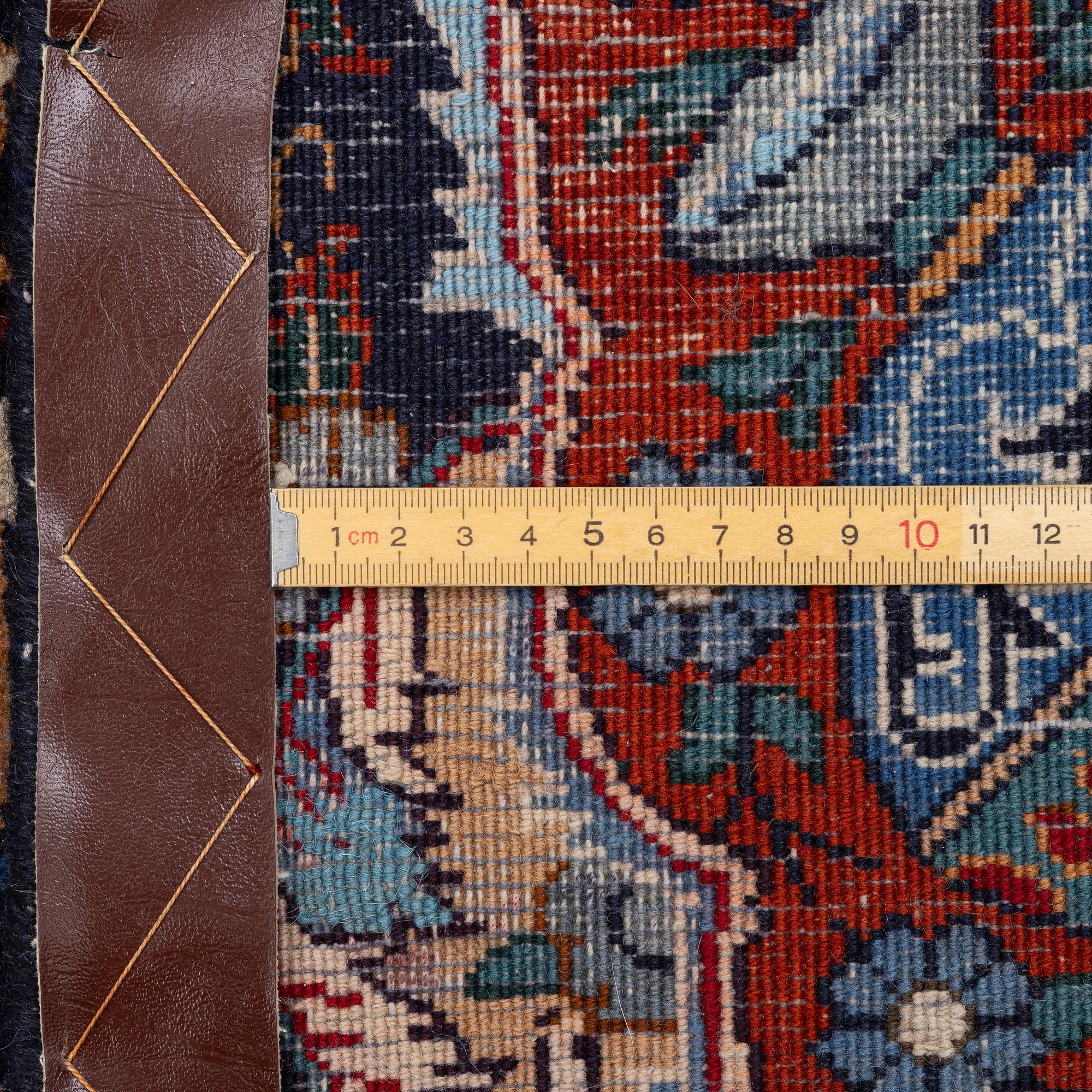A Kashmar carpet, c. 295 x 198 cm.