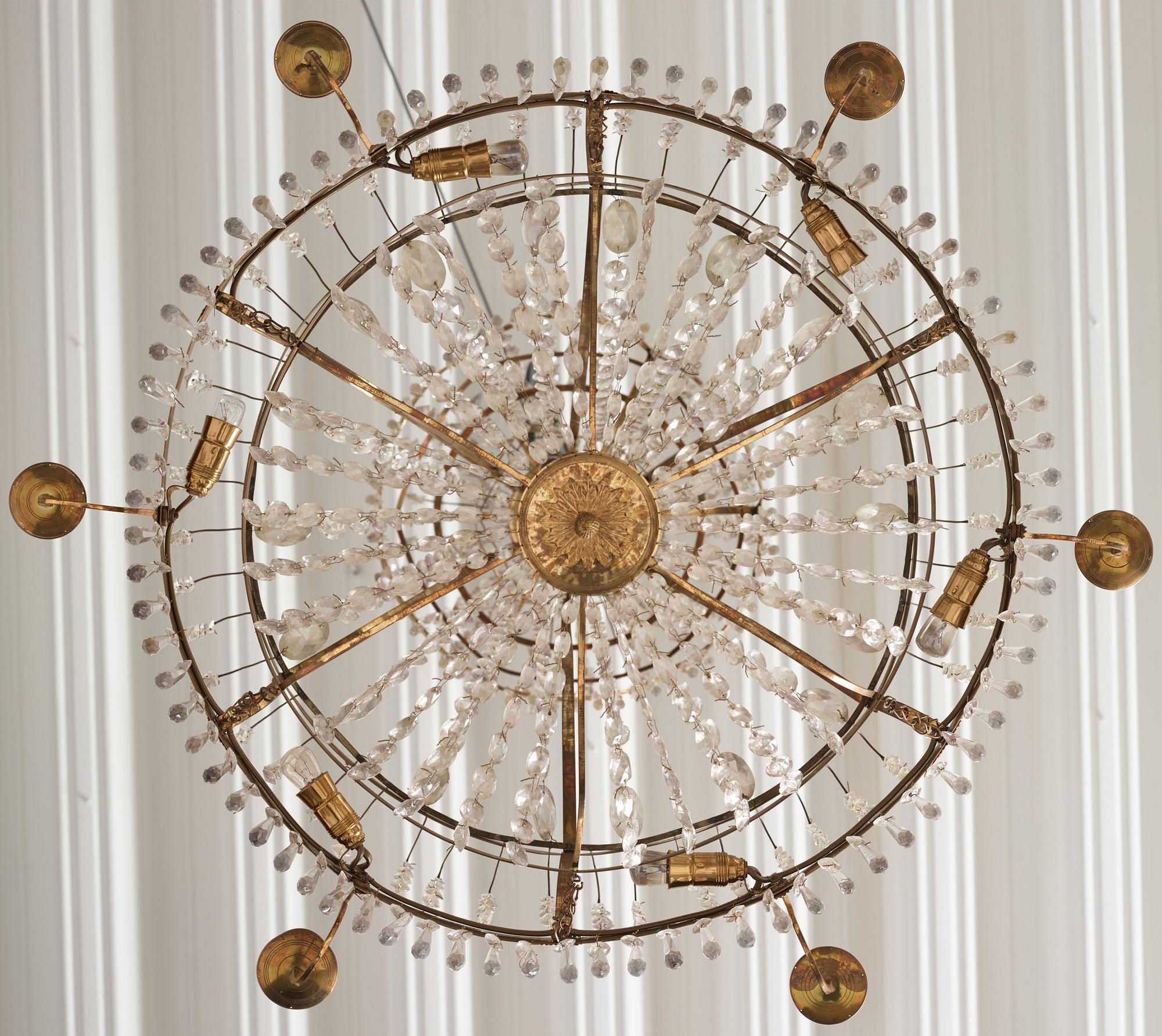 A late Gustavian gilt brass and cut glass seven-light chandelier, Stockholm, late 18th century.