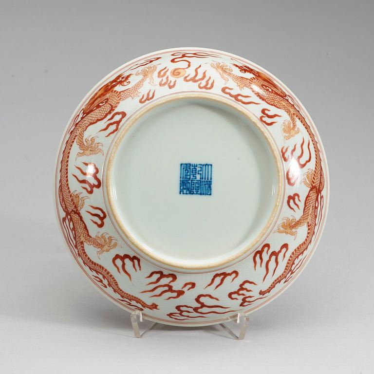 A finely painted dragon dish, Republic (1912-49) with Qianlong seal mark in underglaze.