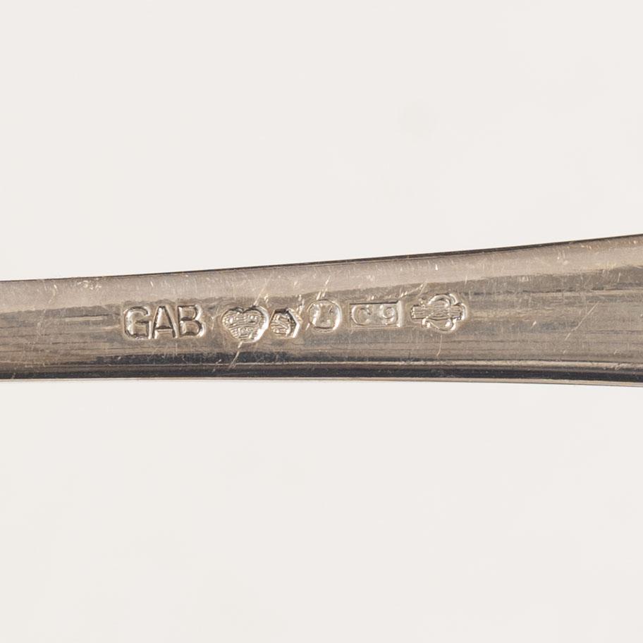 Guldsmedsaktiebolaget (GAB), A 24 piece 'Chippendale' silver cultery service, Stockholm 1950's.