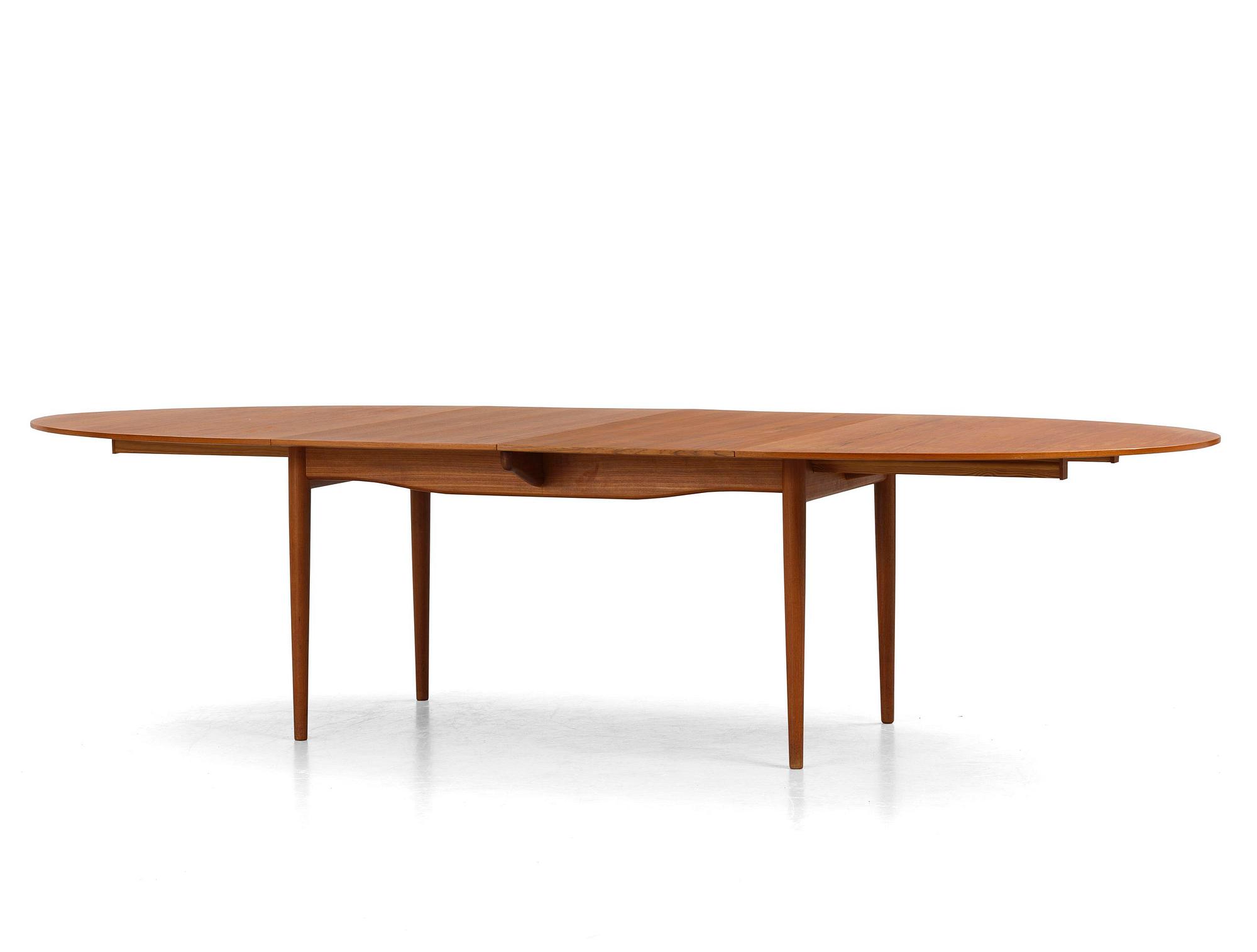Finn Juhl, a teak dining table, Niels Vodder, Denmark, 1960s.