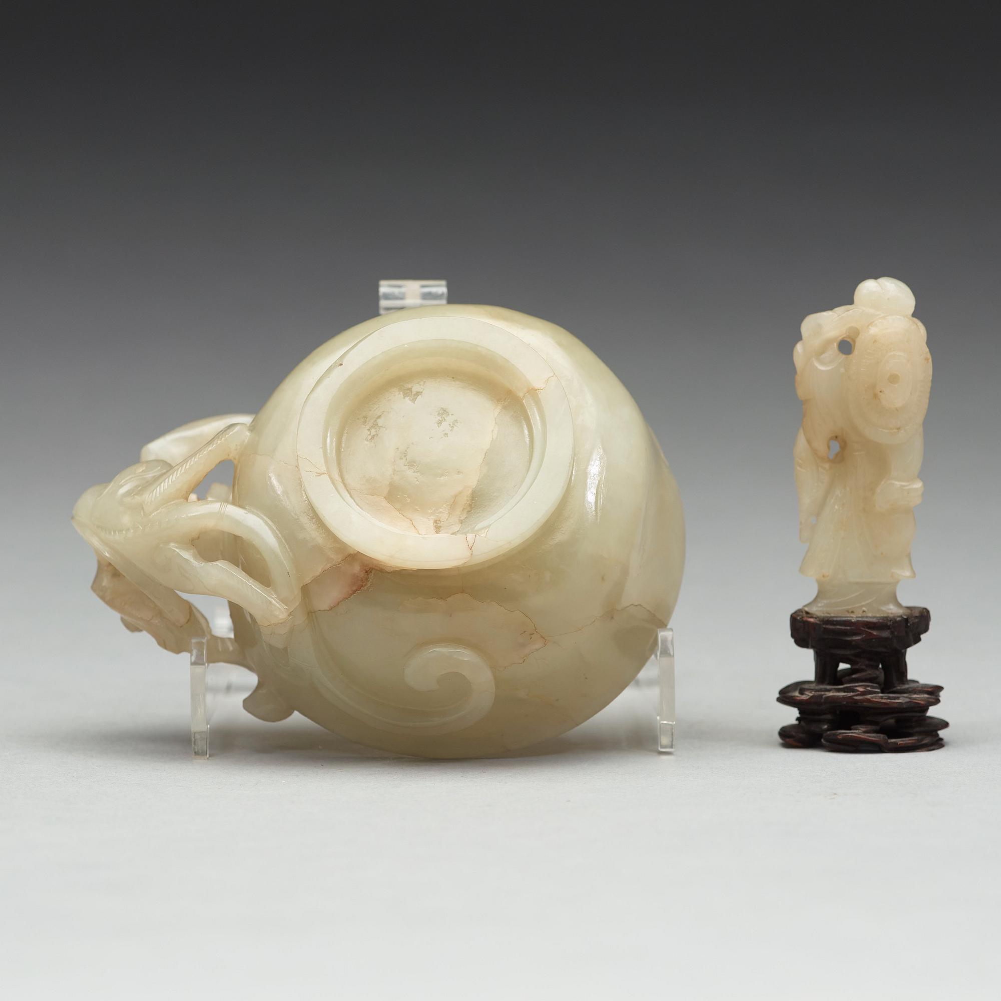 A nephrite cup and figurine, China, early 20th Century.