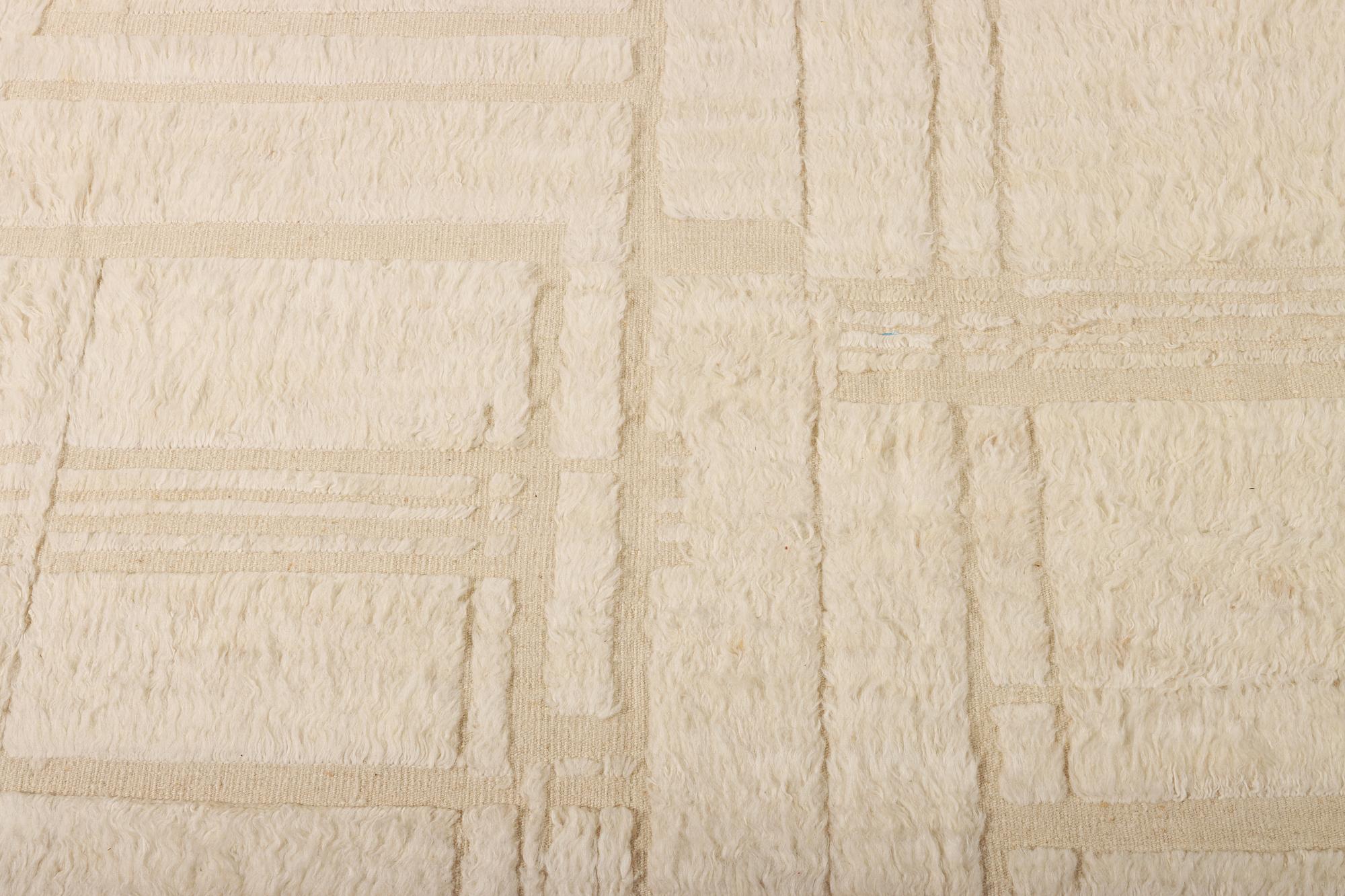 A relief-cut Moroccan carpet, c. 321 x 251 cm.