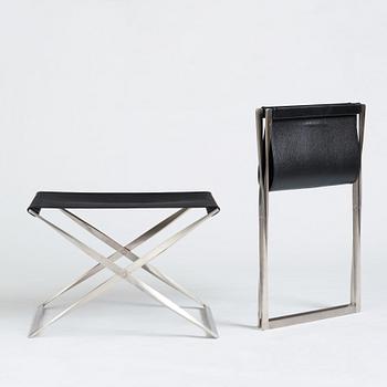 Poul Kjaerholm, a pair of black leather and steel "PK-91" folding stools, edition Fritz Hansen, Denmark.