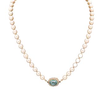 A necklace of cultured pearls, clasp of 18K gold, cabochon cut aquamarine and seed pearls, Atelier Ajour Stockholm 1963.