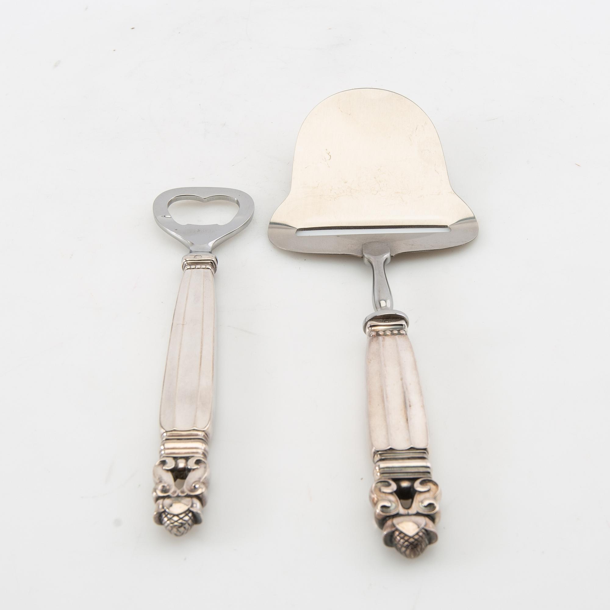 Johan Rohde, cheese slicer and bottle opener, sterling silver, "Konge/Acorn", Georg Jensen, Denmark, after 1945.