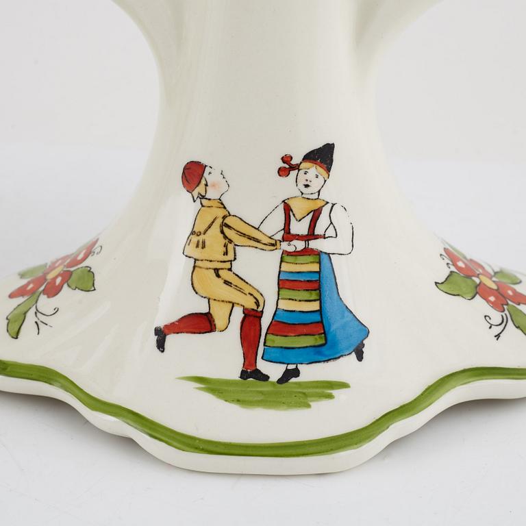A pair of 'Daladansen' creamware candelabra from Rörstrand, Art Nouveau, early 20th Century.