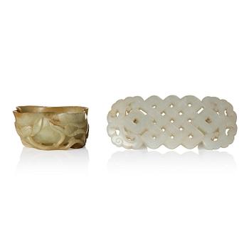 1032. A carved pale celadon coloured nephrite belt buckle and a brush washer, Qing dynasty.