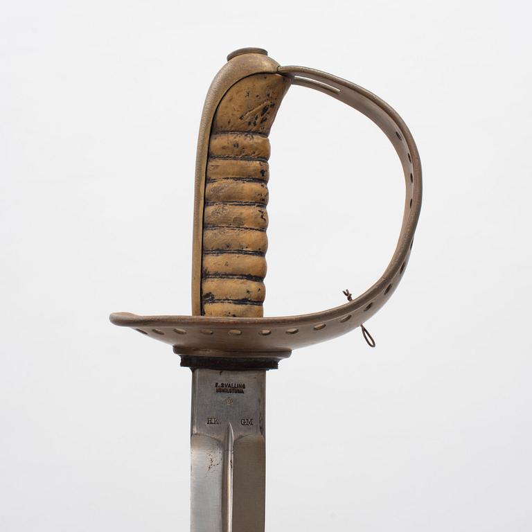A Swedish cavalry saber with scabbard, 1893 pattern.