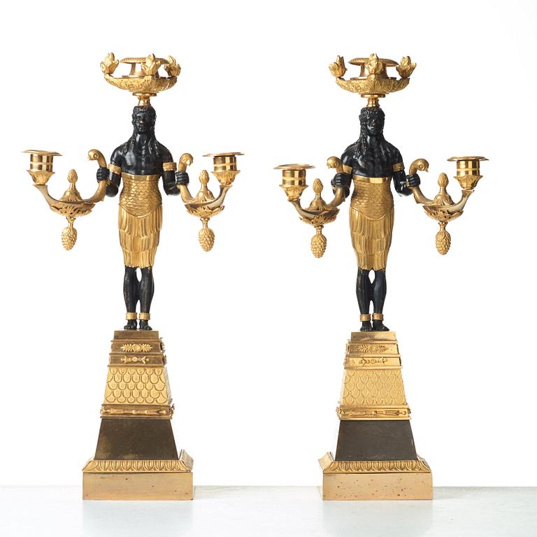 A pair of Empire three-light candelabra, circa 1810.