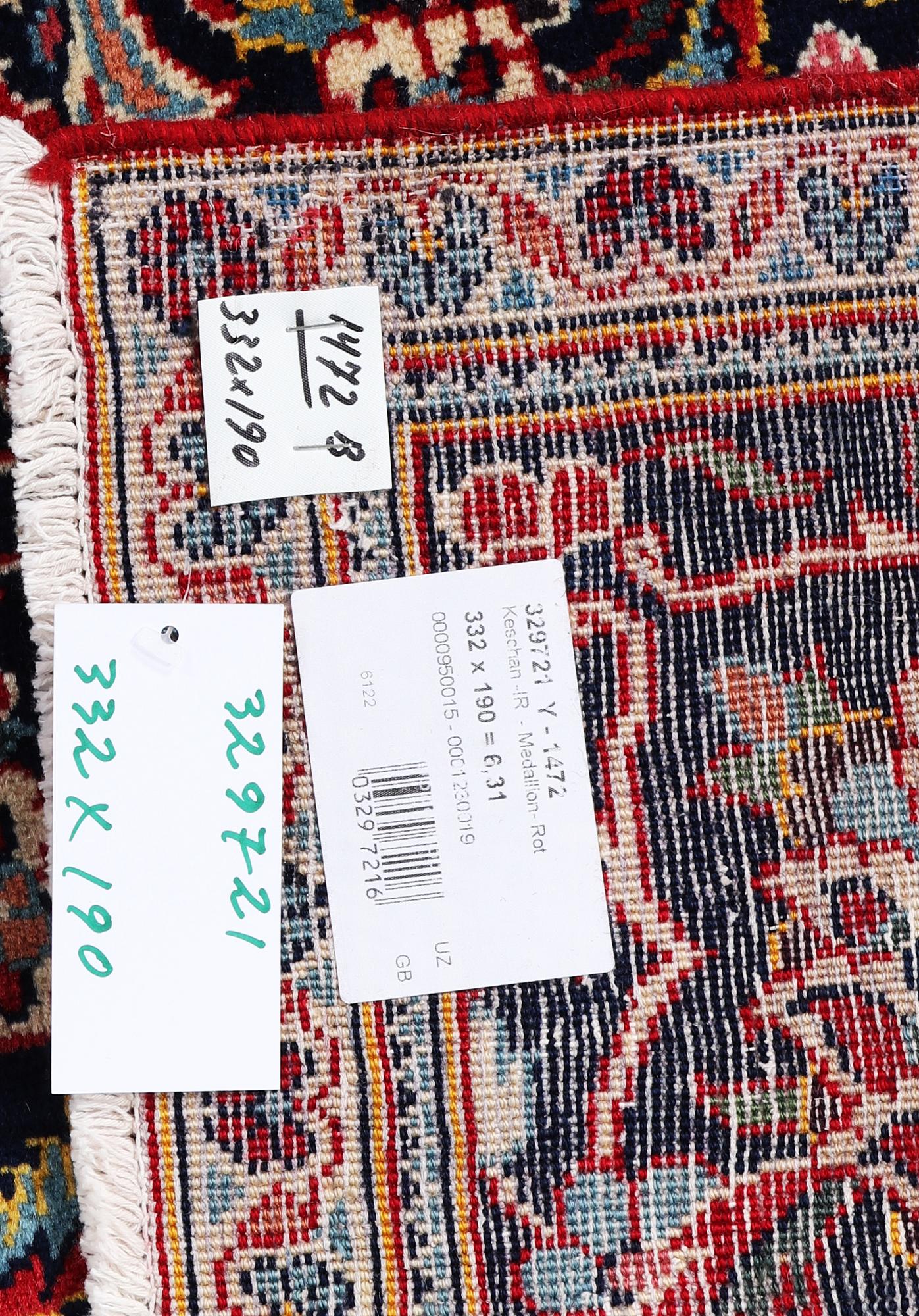 A Kashan carpet, c. 332 x 190 cm.