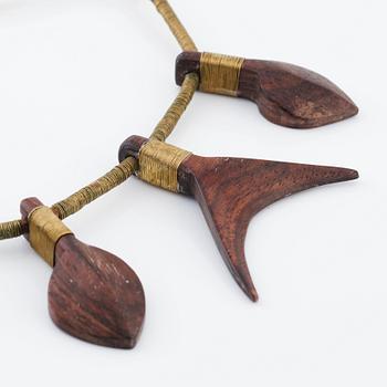 Vivianna Torun Bülow-Hübe, a leather necklace with brass and carved wooden details, most likely 1948-1949.
