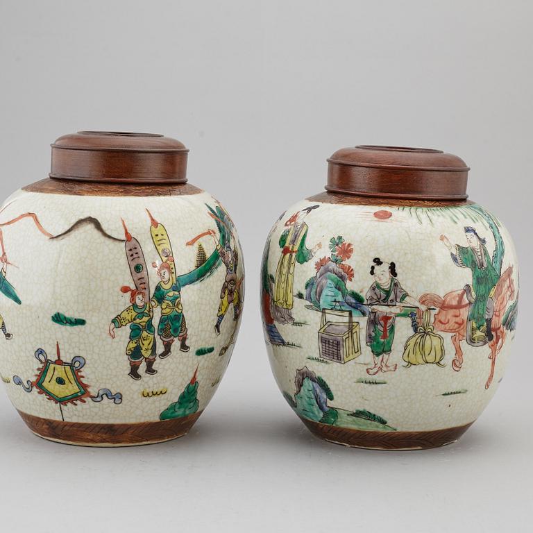 Two Chinese famille verte jars with wooden covers, first half of the 20th century.