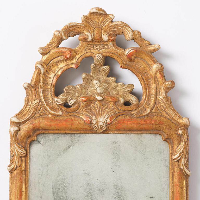 A pair of giltwood one-branch girandole mirrors by JP Larsson.