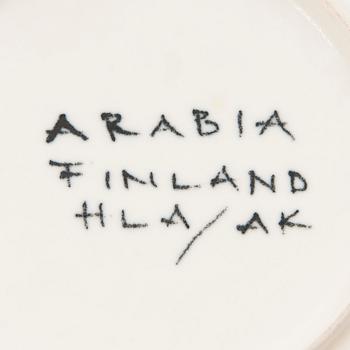 A set of twelve faience 'Sunflower' plates for Arabia, in production 1960-75.