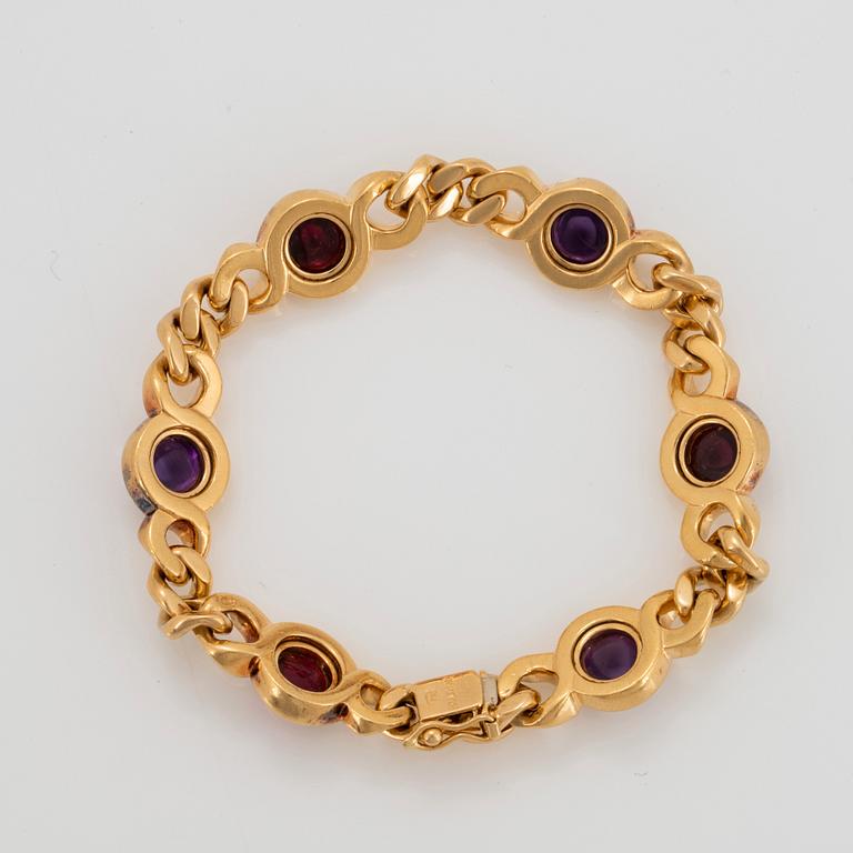 Bulgari armband 18K guld med cabochonslipade ametister och turmaliner.