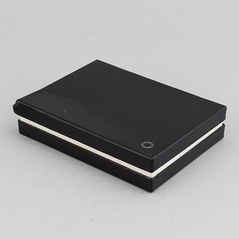 MOntblanc, a ball point pen and leather passport holder.
