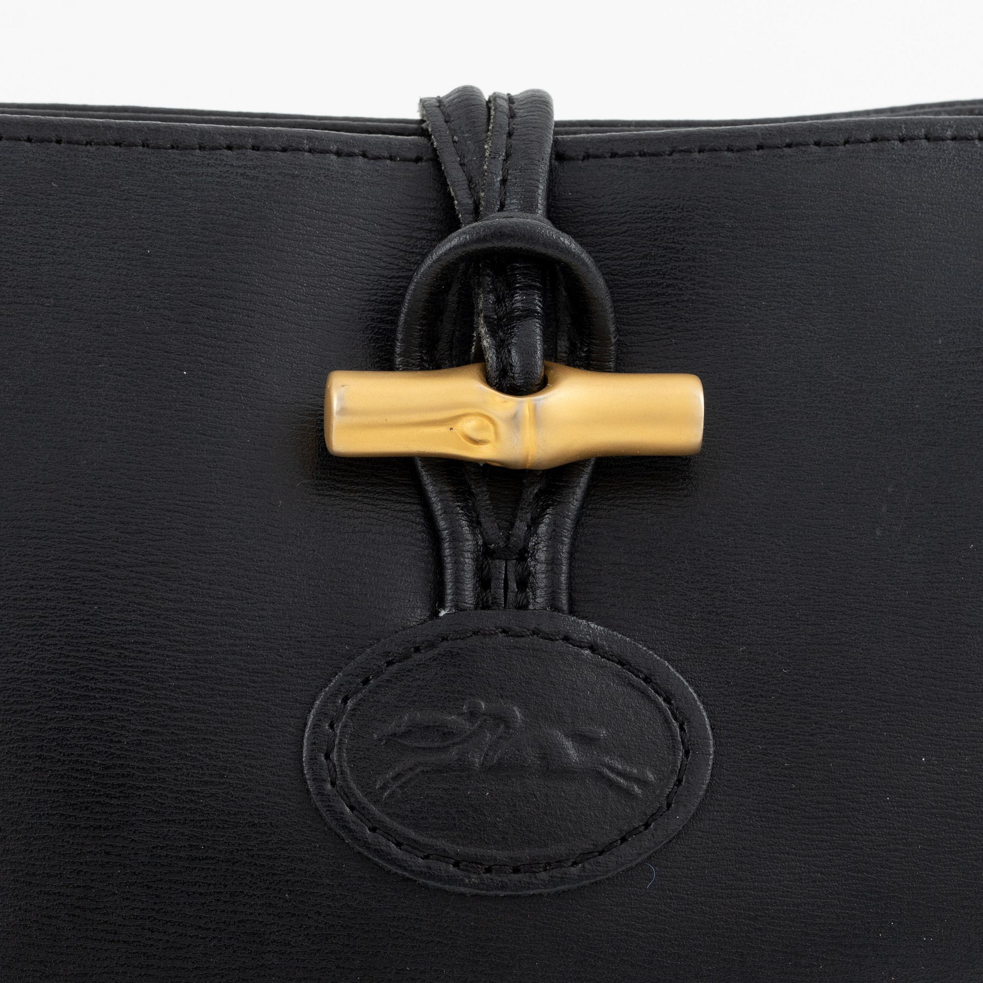 Longchamp, a leather bag.