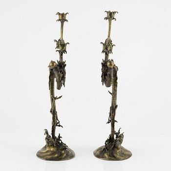 A pair of brass candelabra, Japan, early 20th century.