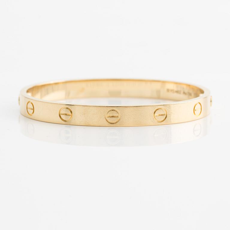 An 18K gold Cartier bracelet "Love".