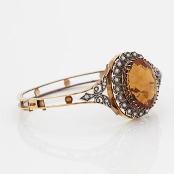 A BANGLE.