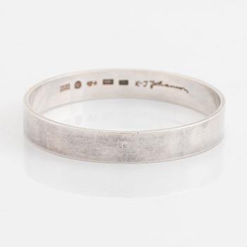Karl-Ingemar Johansson a silver bracelet.