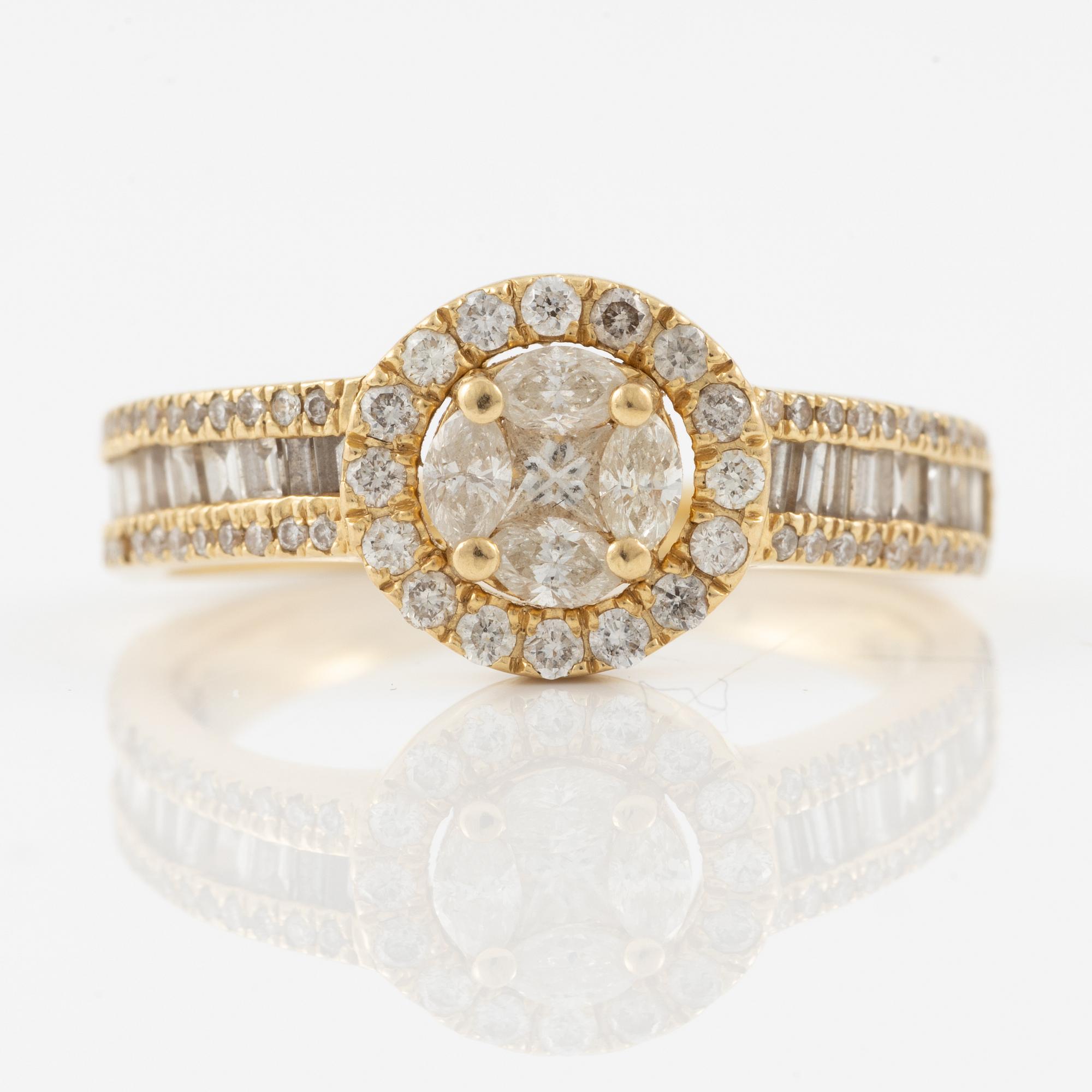 Ring 18K guld med navette-, briljant- och baguetteslipade diamanter.