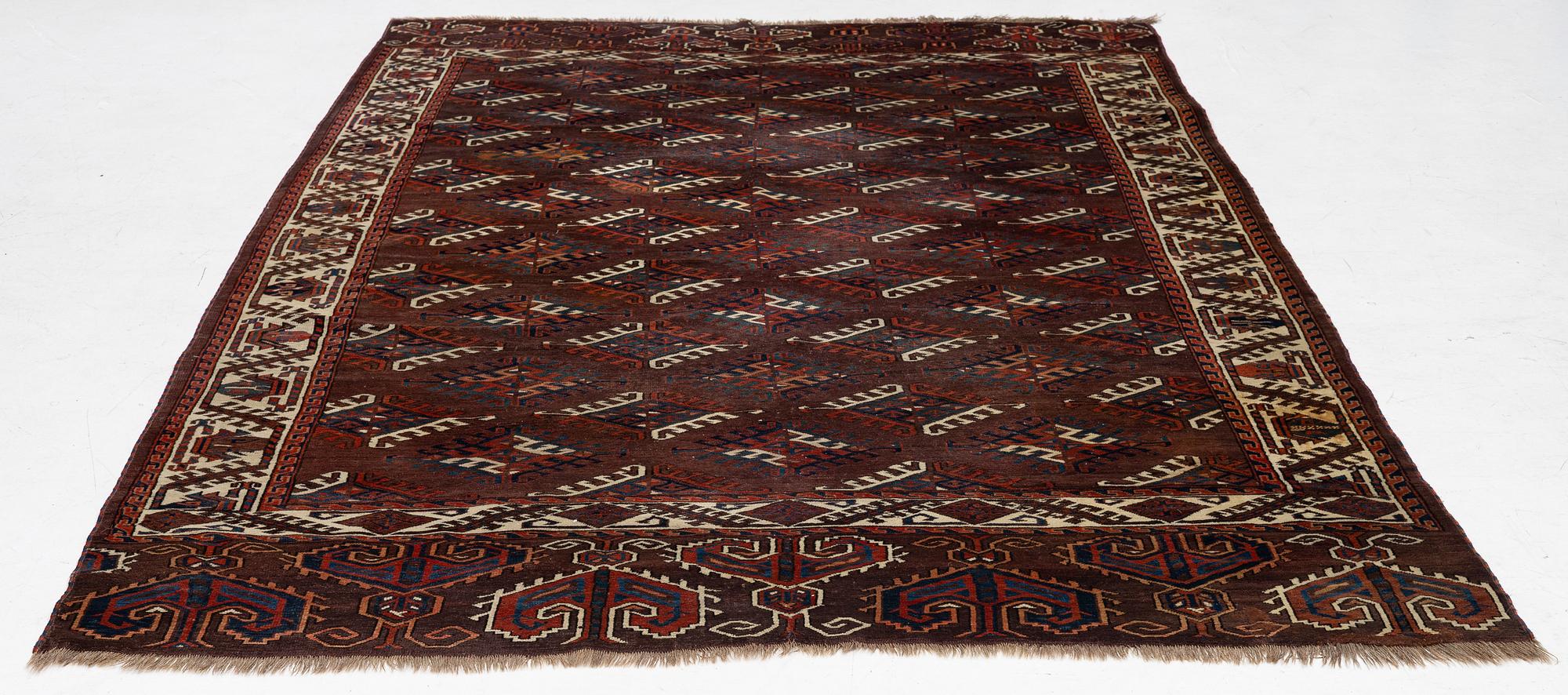 An antique Yomut main carpet, West Turkmenistan, c. 303 x 179 cm.