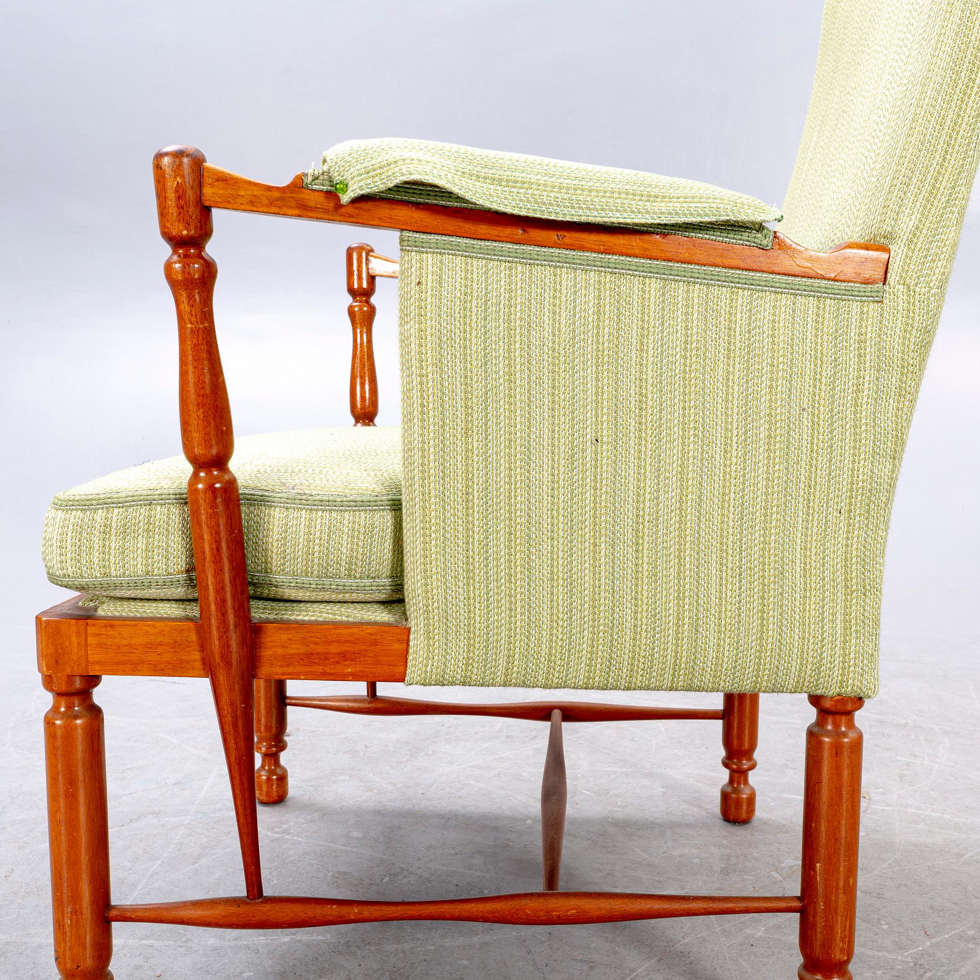 A Josef Frank mahogany armchair model nr 880 Firma Svenskt Tenn.