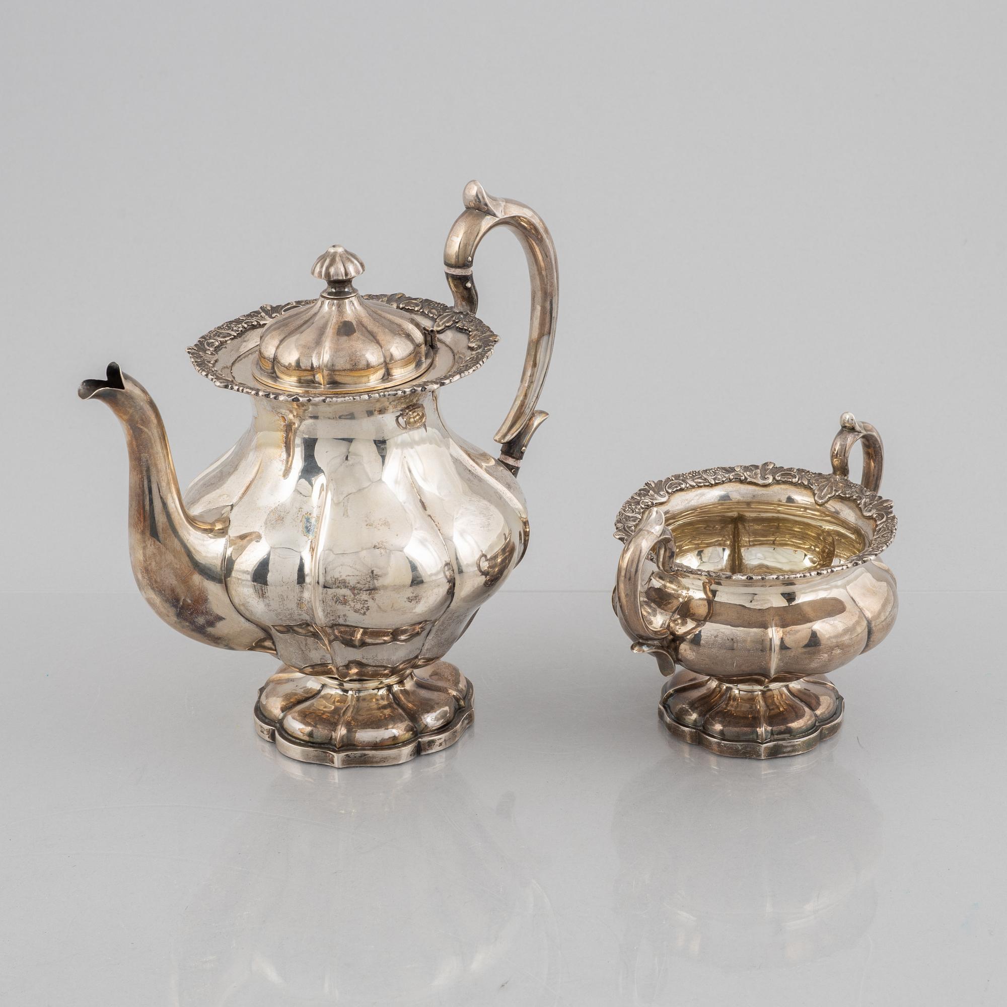 A silver coffee pot and a sugarbowl, marks of J. Mynttinen, Helsinki, Finland 1932.
