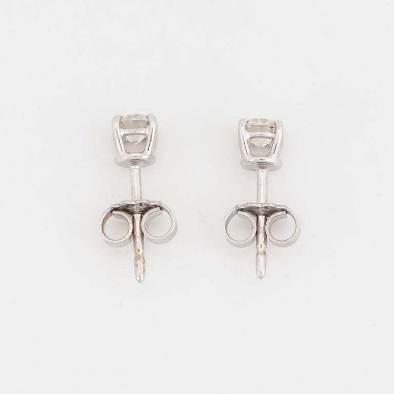 Brilliant-cut diamond earrings.