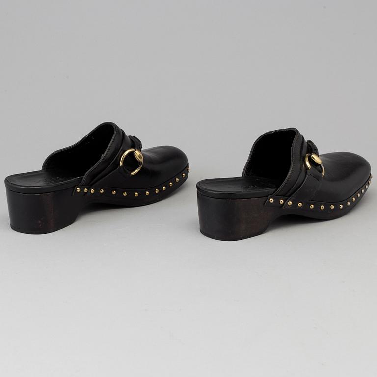 CLOGS by Gucci, size 40.