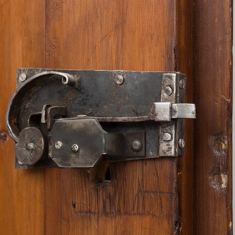 a 1700's Rococo pine cabinet.