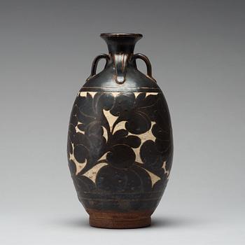 A black-glazed sgraffito vase, presumably Yuan Dynasty.